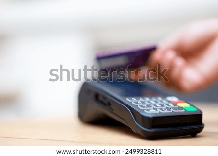 Digital Finance. Man Making a Payment with a Credit Card