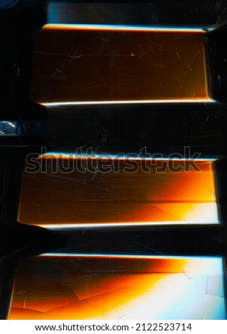 Digital glitch. Fractured overlay. Futuristic noise texture. Blue orange white glow artifacts dust scratches dirt stains on fractured dark black art wallpaper.