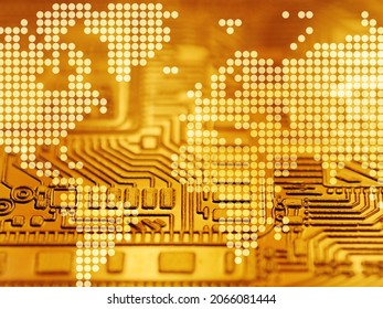 Digital gold concept. Global world map on golden computer circuit board abstract background
