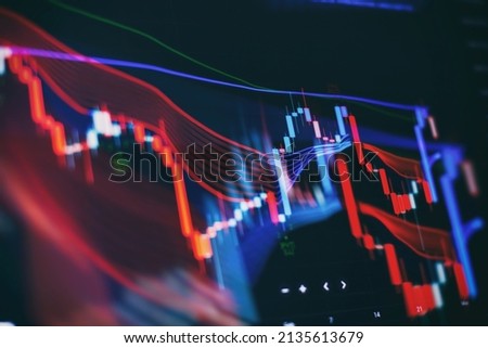 Digital graph interface over dark blue background. Concept of stock market and financial success.