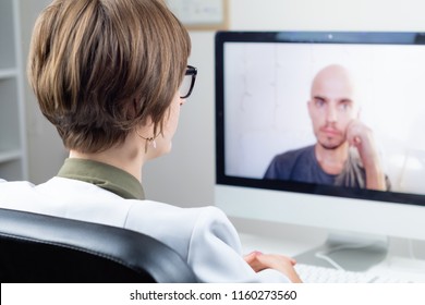 Digital Health Concept: Practicing Physician Having Online Meeting With A Patient. Medical Doctor Consulting A Person By Means Of Web Conference System