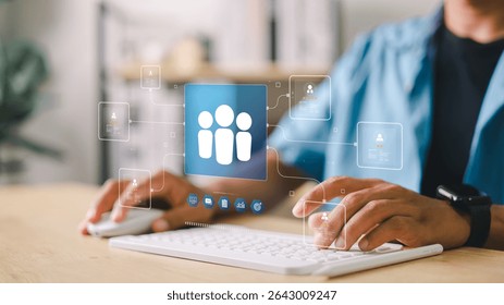 Digital HR system interface showing user profile, team icons, and data dashboard. Businessman managing personnel or customer information via online platform at workspace.