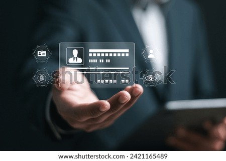 Digital identification or digital ID concept. Businessman show virtual screen of digital identification card to accessing databases by digital identity for cyber security.