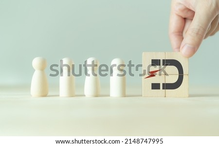 Digital inbound marketing strategy. Attracting potential customers. Customer retention concept. Putting wooden cubes with magnet attracts customer icons on smart grey background and copy space.