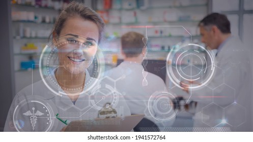 Digital interface with medical data processing against female health worker holding clipboard. medical research and technology concept