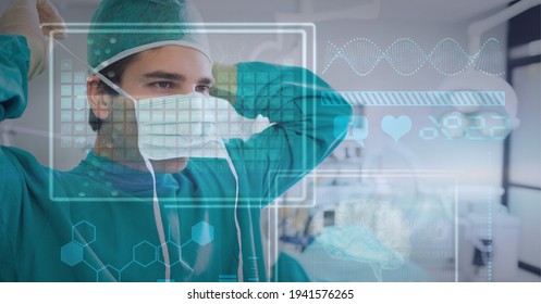 Digital interface with medical data processing against male surgeon wearing face mask. medical research and technology concept
