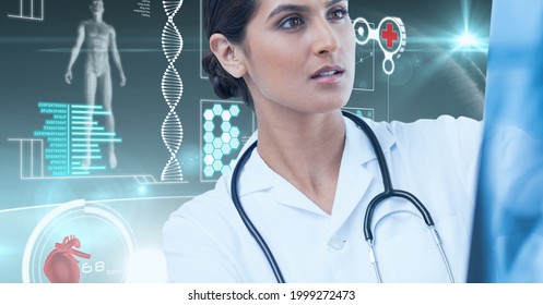 Digital interface with medical data processing against female doctor examining x-ray report. medical research and science technology concept