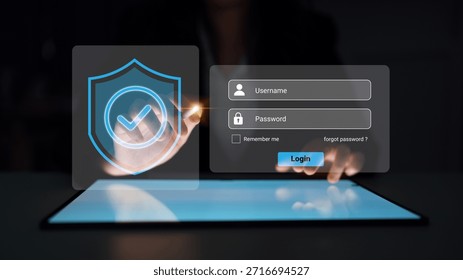 Digital interface showing a login process on a tablet screen, featuring security elements like a shield icon, highlighting modern technology and user authentication. Gantry