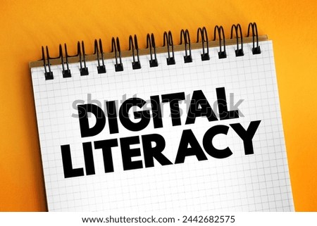 Digital Literacy - ability to find, evaluate, and communicate information by utilizing digital media platforms, text concept on notepad