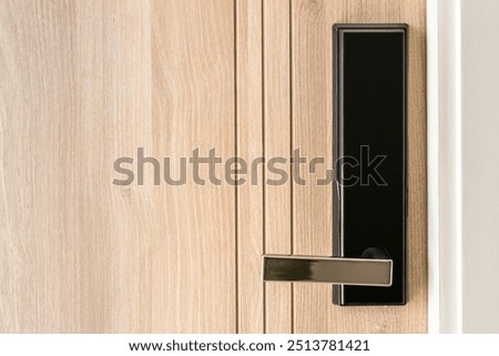 Digital lock pad security system on a wooden door