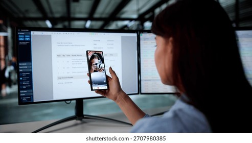 Digital Marketer Scrolling Through Short Videos On Smartphone At Work.