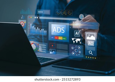 Digital marketing commerce online sale concept, Businessman using laptop with Ads dashboard digital marketing strategy analysis for branding. online advertisement, ad on website and social media.