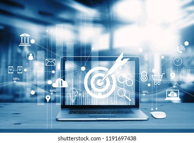 Digital Marketing Concept. Blue Tone. Modern Laptop Screen With Icon Marketing, Success And Goals Target, Payments And Network Connection On Business Technology Background. 
