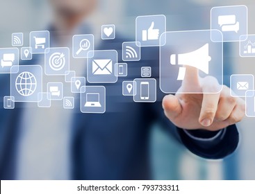 Digital Marketing Concept With Business Person Touching Advertising Campaign Strategy Interface With Email, Social Media, Mobile, Internet And ROI Analytics Icons