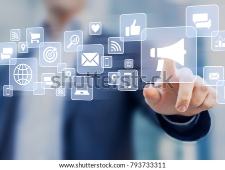 Digital marketing concept with business person touching advertising campaign strategy interface with email, social media, mobile, internet and ROI analytics icons