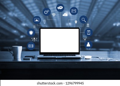 Digital marketing. laptop computer with white screen blank and virtual icon digital marketing network connection. Digital transformation and management business, media technology, blue tone. - Shutterstock ID 1296799945