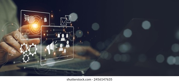 Digital Marketing Media Technology Graphic Concept. Businessman uses laptop to do online marketing to attract customers ,Merchant marketing attracts customers ,Digital Marketing concept,