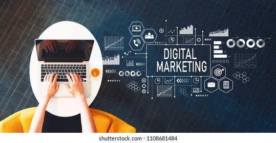 Digital Marketing with person using a laptop on a white table