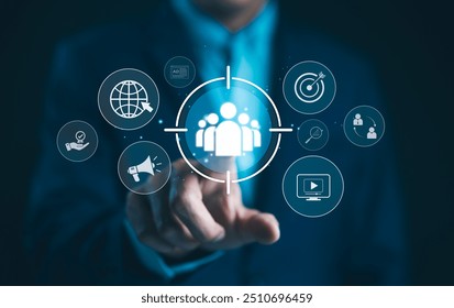 Digital marketing targeting concept. Businessman with marketing icons represent targeting, customer engagement. global reach, Modern strategies in online marketing, customer acquisition, sales growth, - Powered by Shutterstock