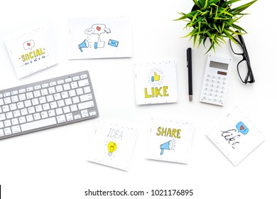 Digital Marketing. Work Desk Of Marketing Specialist With Social Media Icons And Symbols On White Background Top View