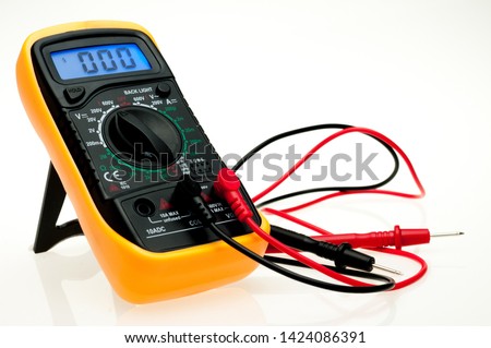 Digital multimeter with probes and blue backlit display on a white background