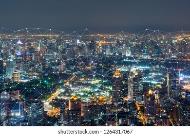 Digital Network Connection Lines Of Sathorn, Bangkok Downtown, Thailand. Financial District And Business Centers In Smart Urban City In Asia. Skyscraper And High-rise Buildings At Night.