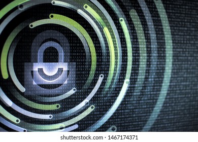 digital padlock on computer screen. double exposure image of binary code number and double lock with circular curves light circling the icons. close focus with blurred background effect.