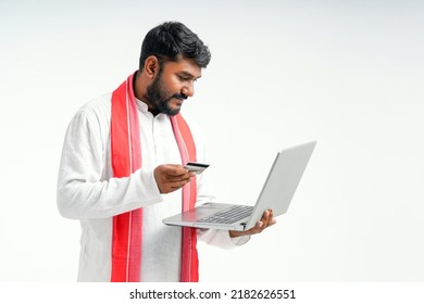Digital Payment Concept : Indian Farmer Using Laptop And Card.