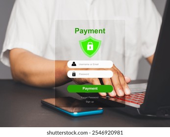 Digital payment login interface with a security icon, user entering login details on laptop, smartphone nearby. Highlights secure and convenient online transactions.