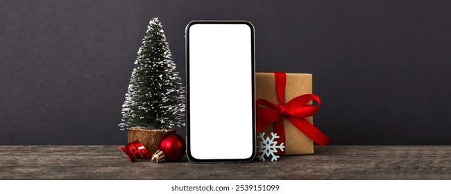 Digital phone mock up with rustic Christmas decorations for app presentation with empty space for you design. Christmas online shopping concept. Tablet with copy space on colored background. - Powered by Shutterstock