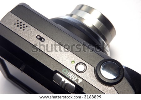 Digital photo camera on white background