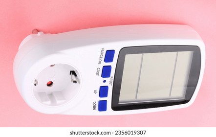 Digital Power Meter on pink background - Shutterstock ID 2356019307