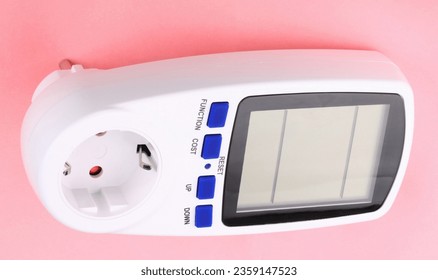 Digital Power Meter on pink background - Shutterstock ID 2359147523