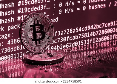 The digital process of cryptocurrency mining by using the GPUs. Bitcoins and video card on a working display and mining screen. Image toned in Viva Magenta, color of the 2023 year