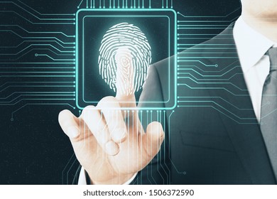 Digital protection concept with digital screen with microchip and fingerprint pushing by businessman.