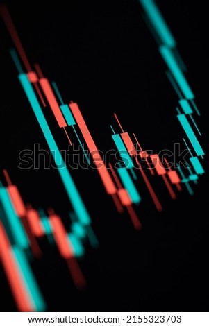 Digital screen with financial trading chart and market quotes and statistics showing cryptocurrency price trend. Technical price candlestick chart graph and indicator stock online trading. 