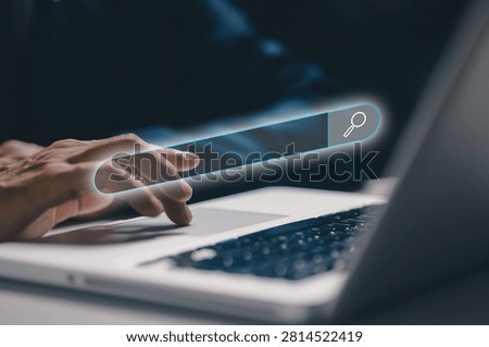 Digital search bar interface floating above a laptop, representing online search, web browsing, information discovery, internet technology, search engine optimization, and modern digital research.