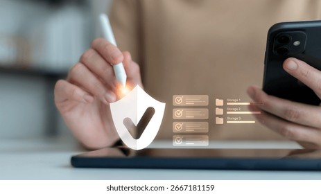 Digital security concept. Hand using a stylus and smartphone to access cloud storage with a security shield icon and data checklists. Modern technology for data protection, privacy, 