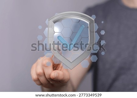 Digital Security: Hand Touching Shield with Check Mark Confirmation