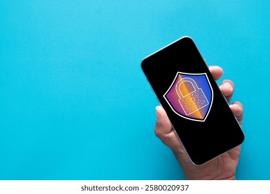 Digital Security,Cybersecurity, Data Protection, Online Privacy,Internet Safety,Secure Access Concept.,Hand Holding Smartphone with Padlock Icon on Screen..,technology and business idea.