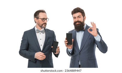 digital shopping. bearded businessmen in formal suit. business communication on meeting. team success. mature men. Agile business. partnership of men speaking on phone. collaboration and teamwork - Shutterstock ID 2364889447