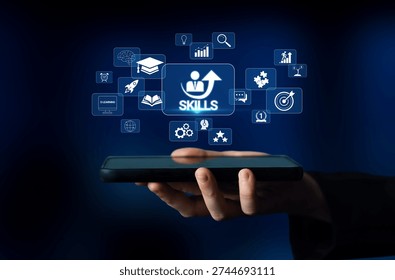 Digital Skill Development Concept with App Icons and Graphs on Mobile Device in Hands Highlighting the Importance of Learning in Modern Society Quark.