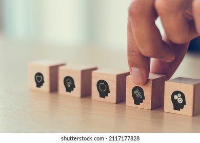 Digital skills concept. New skill, reskill for digital technology evolution. Soft skill,thinking skill, digital skill. Hand holds wooden cube with "digital skill" icon on white background, copy space. - Shutterstock ID 2117177828