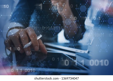Digital software development, blockchain technology. Software developer, man coding programmer working on laptop, digital tablet with binary, computer code, chain digram and technology background