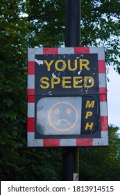 Digital Speed Limit Sign, Displaying An Unhappy Face