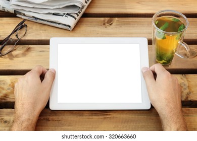 Digital tablet with blank screen in coffee shop cafe - Powered by Shutterstock