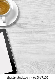 Digital tablet and coffee