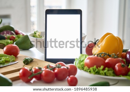 Similar – Image, Stock Photo Fresh vegetables on kitchen table with knife