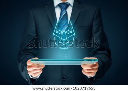 Digital tablet face detection concept. Facial recognition protection and security.