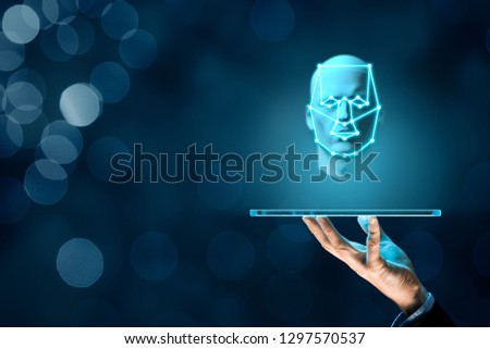 Digital tablet face detection and identification (ID) concept. Facial recognition protection and security.